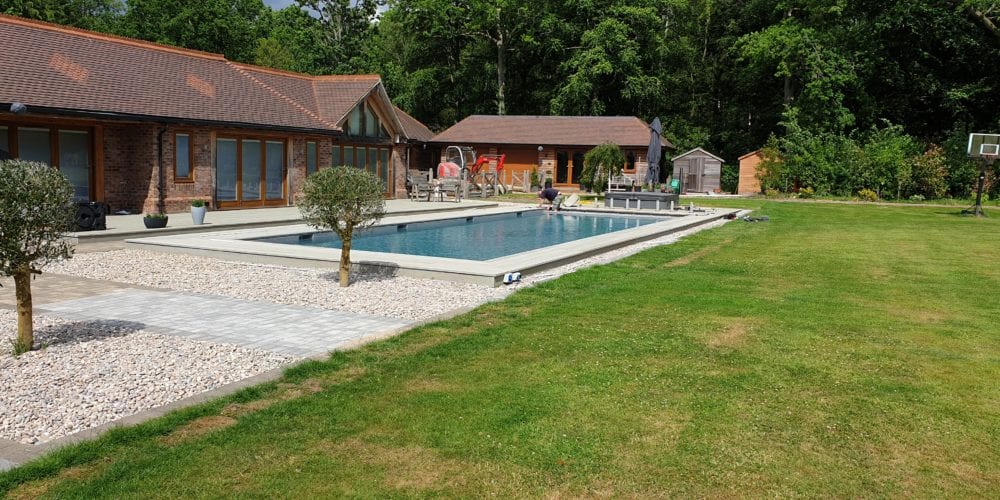 Outdoor swimming pool Outdoor Swimming Pool Installation in Surrey with Aquamatic Cover 4