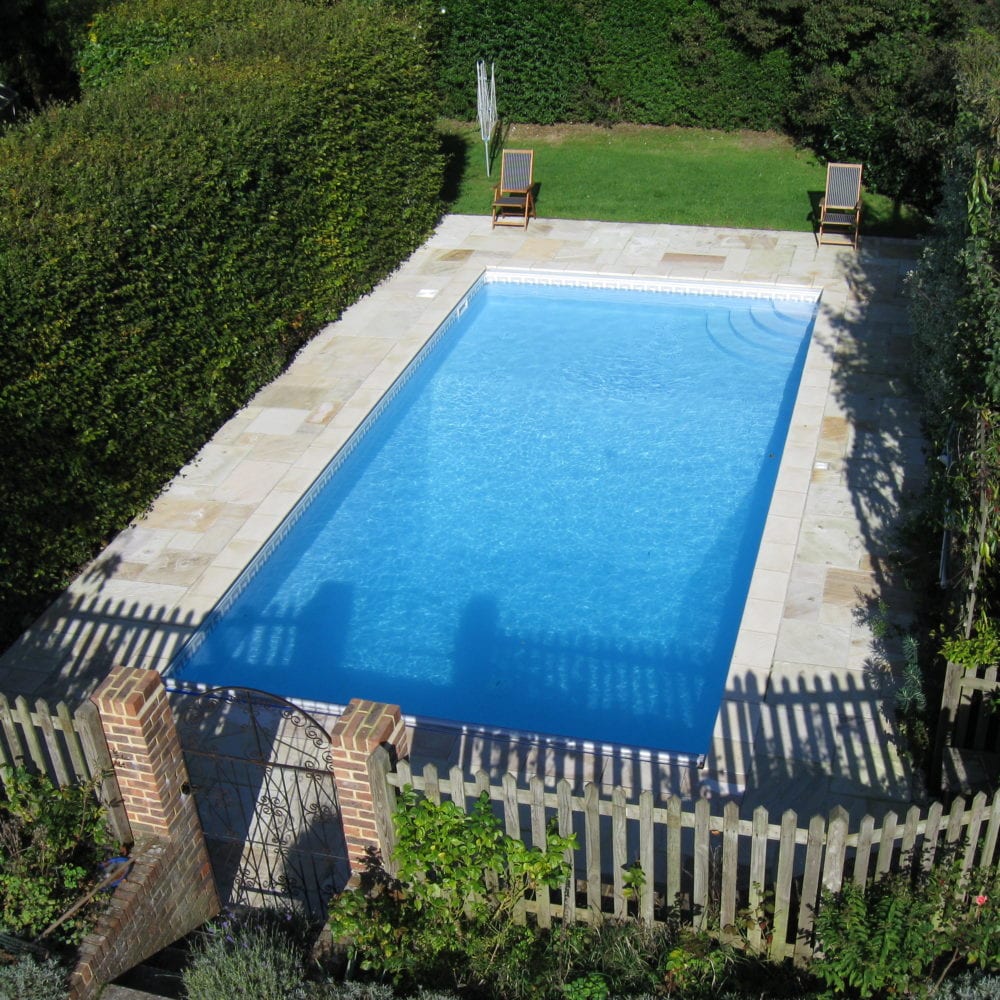Aerial shot of new swimming pool installation in Surrey