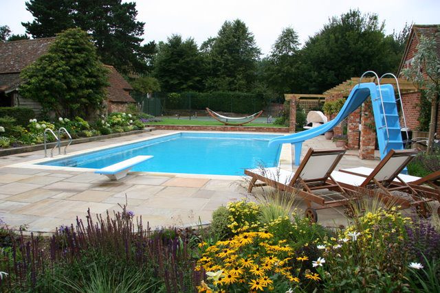 Outdoor Swimming Pool with Slide and Short Diving Board 3