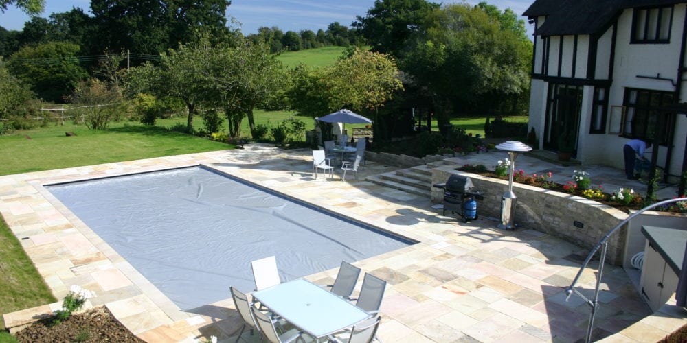 Outdoor Swimming Pool Installation in Surrey with Aquamatic Cover 2