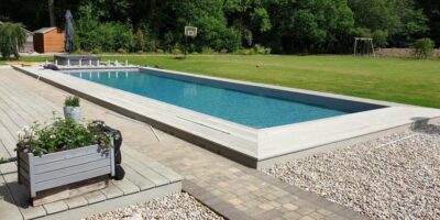 Outdoor Swimming Pool Installation in Surrey with Aquamatic Cover 6