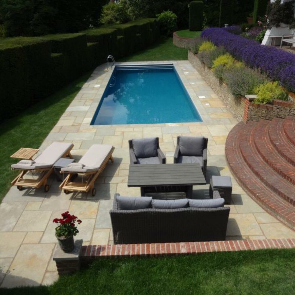 Simple Outdoor Swimming Pool with Paving and Outdoor Seating