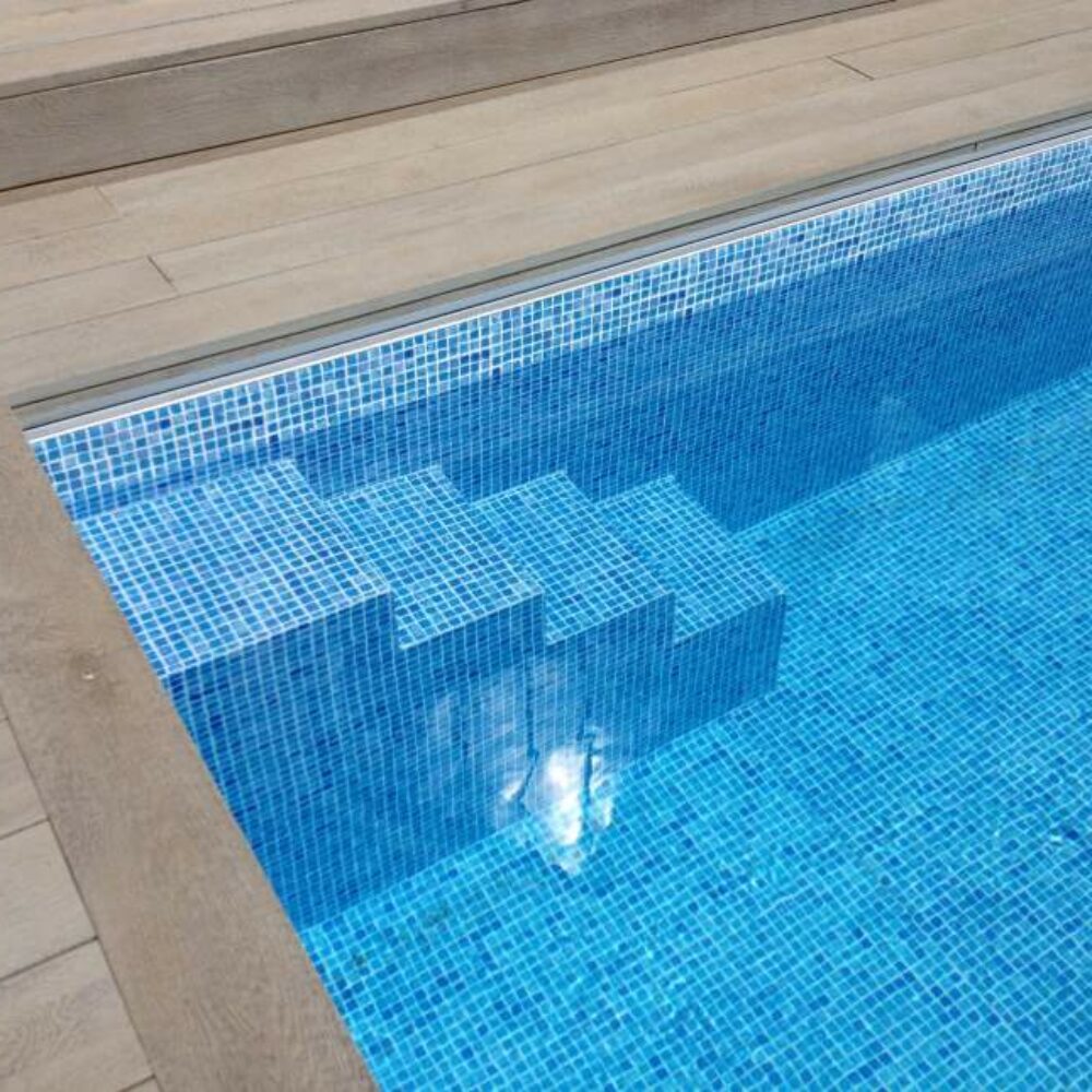 Close up of Mosaic Tile Outdoor Swimming Pool with Steps