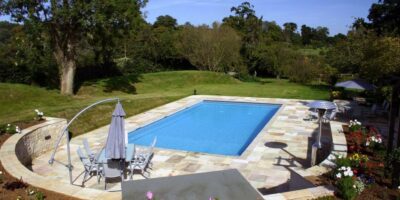 Surrey Outdoor Swimming Pool Installation with Paving